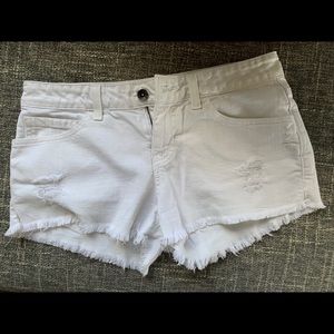 Vans white distressed cut off shorts
